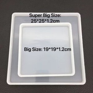 May include: Two clear, square silicone molds. The larger mold is 9.8 x 9.8 x 0.5 inches, and the smaller mold is 7.5 x 7.5 x 0.5 inches. Text on the image reads "Super Big Size: 25*25*1.2cm" and "Big Size: 19*19*1.2cm".