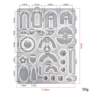 May include: A clear silicone mold with 18 different shapes for making earrings. The mold measures 11.6 inches by 15 inches. The shapes include arches, circles, ovals, and geometric shapes.