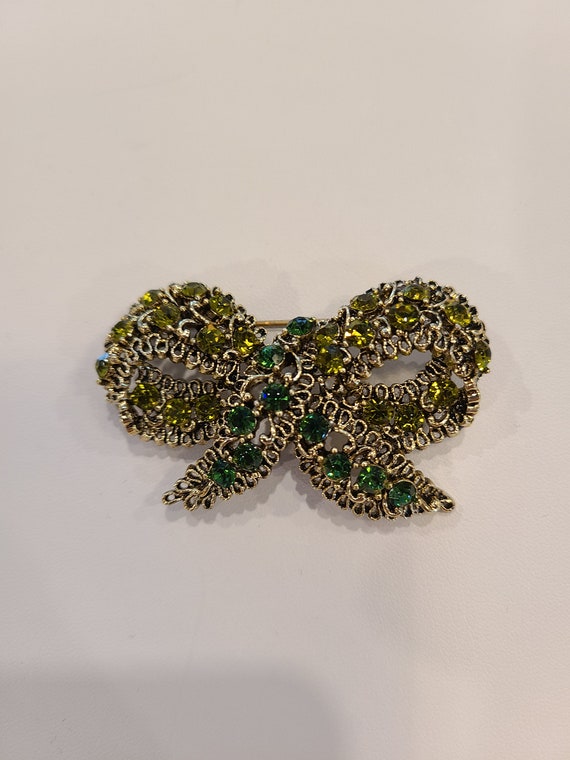Vintage green faux crystal brooch