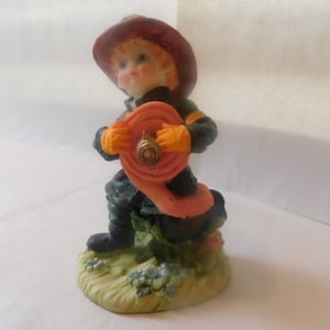 Boy Fireman with Hose Figurine Statue Vintage Firefighter Fig320