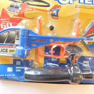 Toy Zoom Police Copter launcher Helicopter Flies Upto 60 feet Vintage image 8