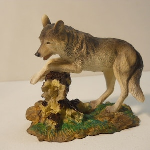 Wolf on tree stump log Figurine Collectibles Statue