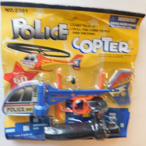 Toy Zoom Police Copter launcher Helicopter Flies Upto 60 feet Vintage image 5