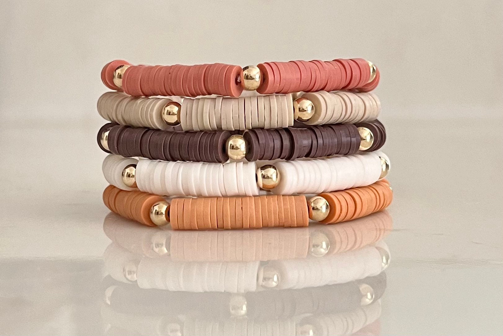 NBEADS 4pcs 4 Styles Polymer Clay Heishi Beads Stretch Bracelets Sets, Stackable Bracelets, with 304 Stainless Steel Spacer Beads and Brass