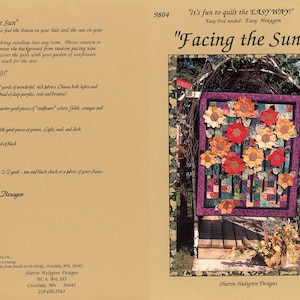 K&ouml;nnte beinhalten: Ein Quiltmuster mit dem Titel "Facing the Sun" mit einem Sonnenblumenmotiv. Der Quilt ist aus verschiedenen Stoffen in Gelb-, Orange-, Rot-, Braun- und Gr&uuml;nt&ouml;nen gefertigt. Das Muster verwendet das Easy Hexagon-Werkzeug und ben&ouml;tigt 2,5 Meter Stoff.