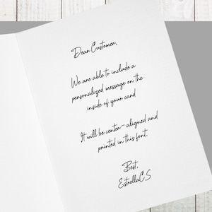 May include: A handwritten note on a white card that reads "Dear Customer, We are able to include a personalized message on the inside of your card. It will be center-aligned and printed in this font. Best. EstrellaCS"