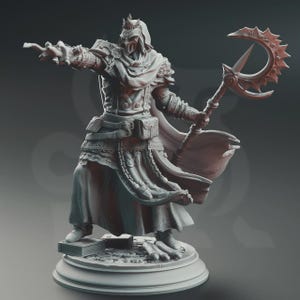 May include: A detailed grey figurine of a fantasy character in ornate armour, holding a crescent-shaped staff. The figure stands on a circular base with a book. The character has a helmet and flowing robes, with intricate detailing.
