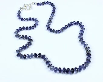 Iolite Faceted Rondelle Beads Necklace: Hand Knotted Finish With 925 Sterling Silver Lobster Lock.
