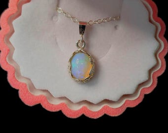 Genuine 10x8mm AAA Ethiopian opal in sterling silver floral bezel pendant necklace