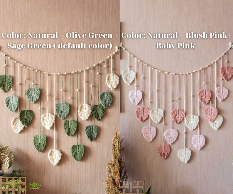 May include: Two macrame wall hangings with a string of wooden beads. The first wall hanging features leaves in shades of green and natural white. The second wall hanging features leaves in shades of pink and natural white. The text "Color: Natural + Olive Green + Sage Green (default color)" is above the first wall hanging. The text "Color: Natural + Blush Pink + Baby Pink" is above the second wall hanging.