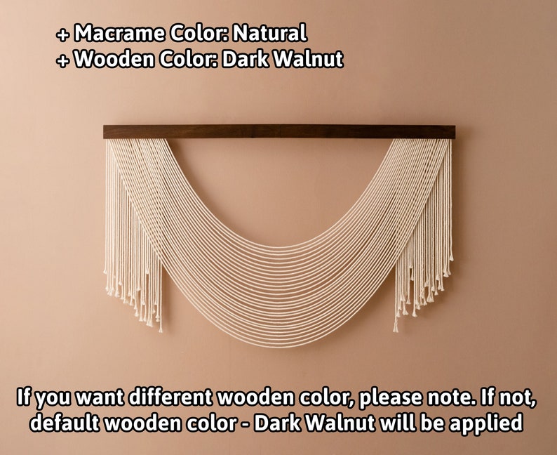 May include: A natural macrame wall hanging with a dark walnut wood dowel. The macrame is in the shape of a half-circle with long strands hanging down.  "If you want different wooden color, please note. If not, default wooden color - Dark Walnut will be applied."