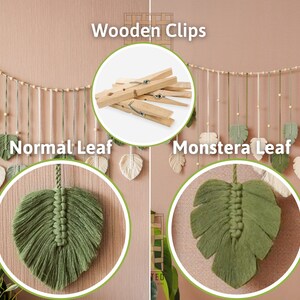 May include: A wall hanging with a string of green and white macrame leaves, some shaped like monstera leaves, and some shaped like regular leaves. The leaves are attached to a string with wooden beads and are hung with wooden clips. The text "Wooden Clips", "Normal Leaf", and "Monstera Leaf" are visible in the image.