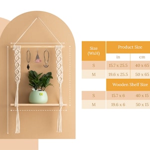 May include: A macrame wall hanging with a wooden shelf and two sizes of hanging jewellery organisers. The shelf is 15.7 inches wide by 6 inches deep, or 40 cm wide by 15 cm deep. The larger organiser is 19.6 inches wide by 25.5 inches high, or 50 cm wide by 65 cm high. The smaller organiser is 15.7 inches wide by 25.5 inches high, or 40 cm wide by 65 cm high.