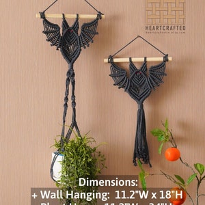 May include: Two macrame wall hangings in the shape of bats with red eyes. The larger hanging is a plant hanger with a 11.2 inch wide by 34 inch long macrame cord. The smaller hanging is a wall hanging with a 11.2 inch wide by 18 inch long macrame cord.  HEARTCRAFTED heartcraftedvn.etsy.com