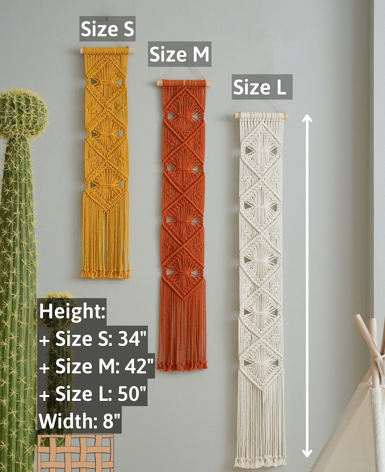 May include: Three macrame wall hangings in different sizes, with a yellow, orange, and white color scheme. The hangings are made with a knotting technique and have a fringe at the bottom. The sizes are labeled as "Size S", "Size M", and "Size L". The measurements are listed as: Height: Size S: 34", Size M: 42", Size L: 50", Width: 8".