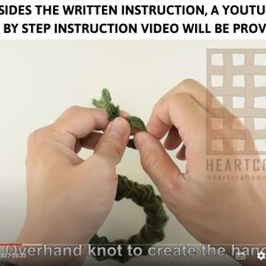 May include: Close-up of a hand tying an overhand knot in a green rope. The text "HEARTCRAFTI heartcraftedvn.etsy.c" is visible in the background.