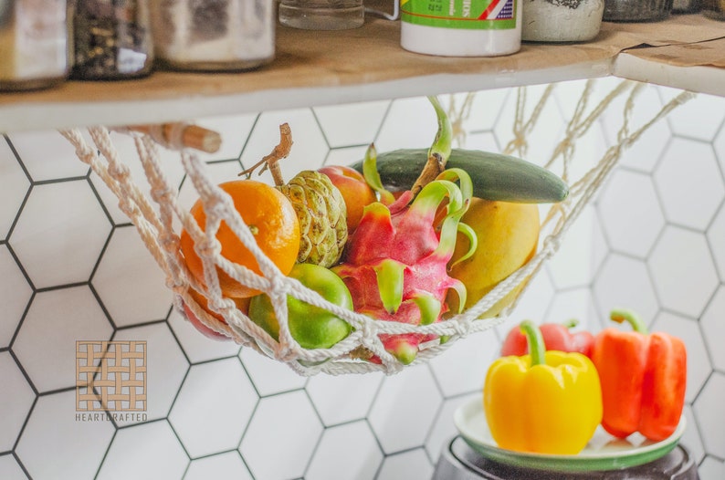 This Macrame Fruit Hammock is perfect for Fruit Holder, Kitchen Storage, Food Storage  bringing along lovely bohemian vibe. This could be a perfect idea for Gift For Mom, Unique Gift, New Home Gift.