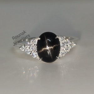 Black Star Diopside Ring: Oval Gemstone, Sterling Silver & Cubic Zirconia