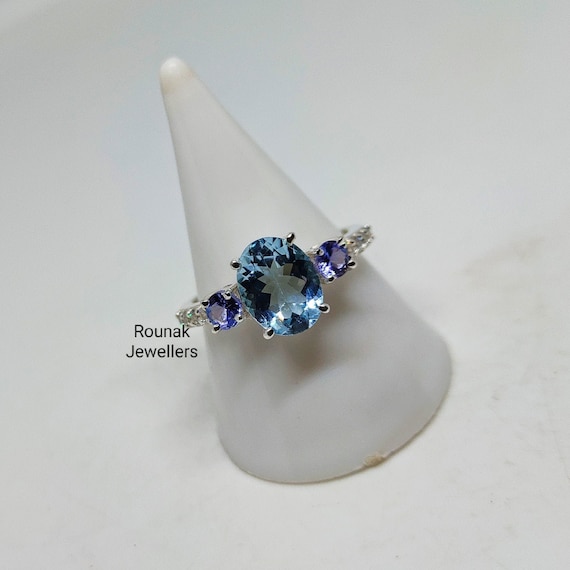 Aquamarine and store tanzanite ring