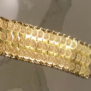Gold Talisman Multilayered Bracelet