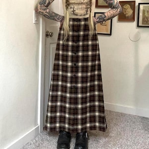 May include: A rustic wooden sign with the text "Welcome to our home" in a handwritten style. The sign features a distressed finish and a simple, inviting design, perfect for a front porch or entryway.