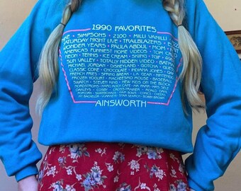 90s vintage turquoise raglan “1990s Favorites” crewneck sweatshirt
