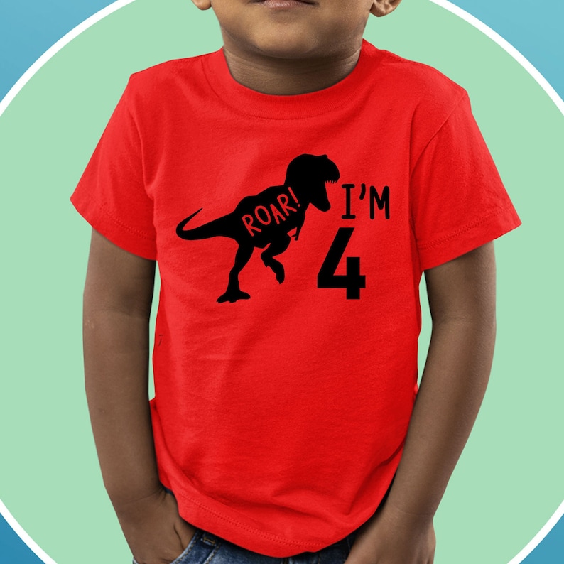 May include: Red t-shirt with a black dinosaur silhouette and the text "Roar! I'm 4".