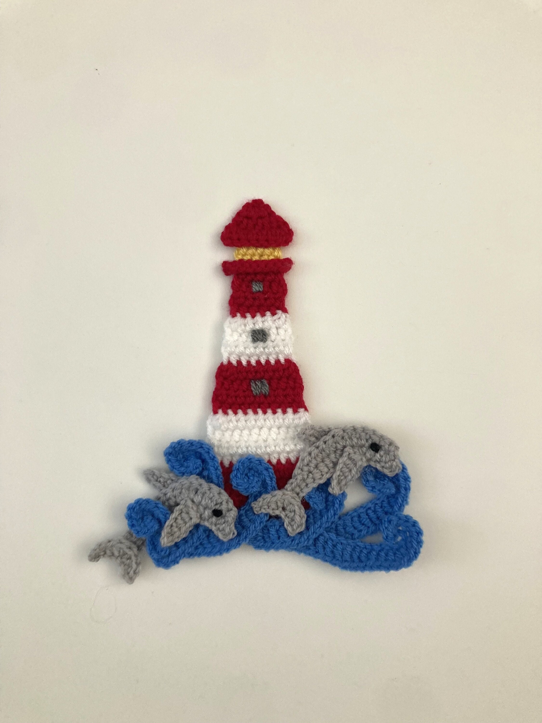 40 Dolphin Crochet Patterns for Ocean-Inspired Amigurumi, Gifts, and Nursery Decor 24 Dolphin Lighthouse Crochet Applique