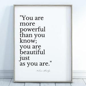 May include: Black and white typography print with a quote by Melissa Etheridge: "You are more powerful than you know; you are beautiful just as you are."