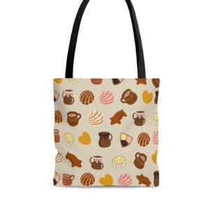 May include: A beige tote bag with a pattern of brown, pink, and yellow Mexican pastries and mugs of hot chocolate.