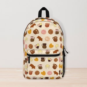 May include: A beige backpack with a colorful pattern of Mexican pastries and hot chocolate. The pattern includes conchas, pan dulce, churros, and traditional clay mugs.