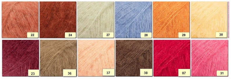 May include: A collection of yarn samples in various colors, including peach, red, brown, beige, blue, orange, and pink. The yarn is arranged in a grid pattern with numbers below each sample.