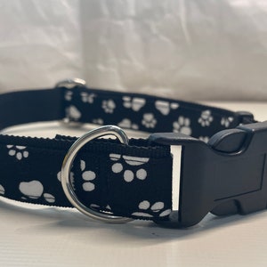Adjustable dog collar in black white paws