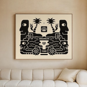 May include: Framed black and cream artwork featuring stylized faces, palm trees, and the words "IMMACULATE VIBES." The design also includes a diamond and seashell. The artwork is displayed above a cream-coloured sofa in a living room setting.
