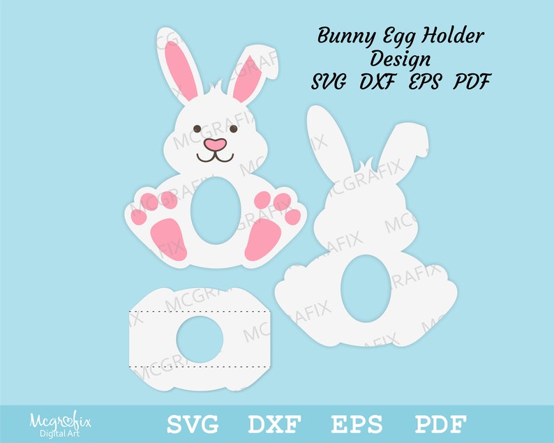 May include: A white bunny egg holder design with pink ears and paws. The design is available in SVG, DXF, EPS, and PDF formats. Bunny Egg Holder Design SVG DXF EPS PDF
