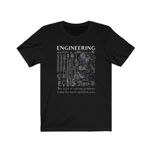 May include: Black t-shirt featuring a white graphic design of various engineering tools and the text "ENGINEERING. The craft of solving problems using the most optimum way."
