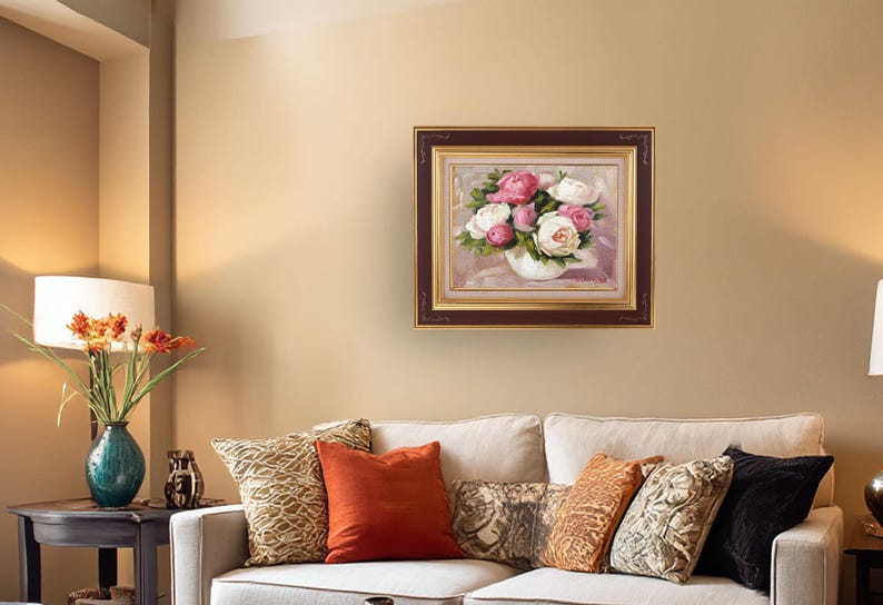 Peony oil painting original of a bouquet of peonies in a round white vase. The flowers are a mix of white and pink, with green leaves. The background is light and warm. The artist's signature is in the bottom right corner.