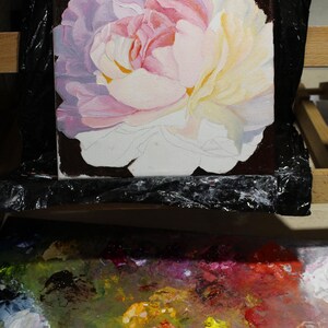 Peony oil painting. A close-up of a single, pale pink peony flower with a white center. The flower is painted in a realistic style with visible brushstrokes. The background is black.