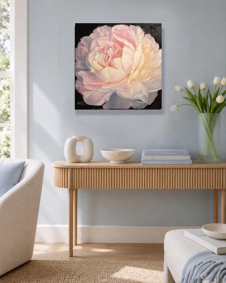 Peony oil painting. A close-up of a single, pale pink peony flower with a white center. The flower is painted in a realistic style with visible brushstrokes. The background is black. Signature of artist