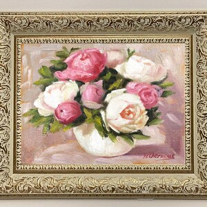 Peony oil painting original of a bouquet of peonies in a round white vase. The flowers are a mix of white and pink, with green leaves. The background is light and warm.