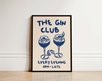 Puede incluir: Un póster enmarcado en negro con un fondo beige claro. El póster presenta una ilustración azul de dos vasos de ginebra con gajos de lima. El texto "THE GIN CLUB" está en azul y el texto "EVERY EVENING 6PM-LATE" está en azul.
