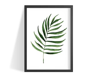 May include: A framed watercolour painting of a single green palm leaf on a white background.