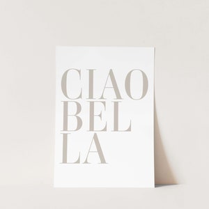 May include: A white print with the text "CIAO BEL LA" in a light gray color.