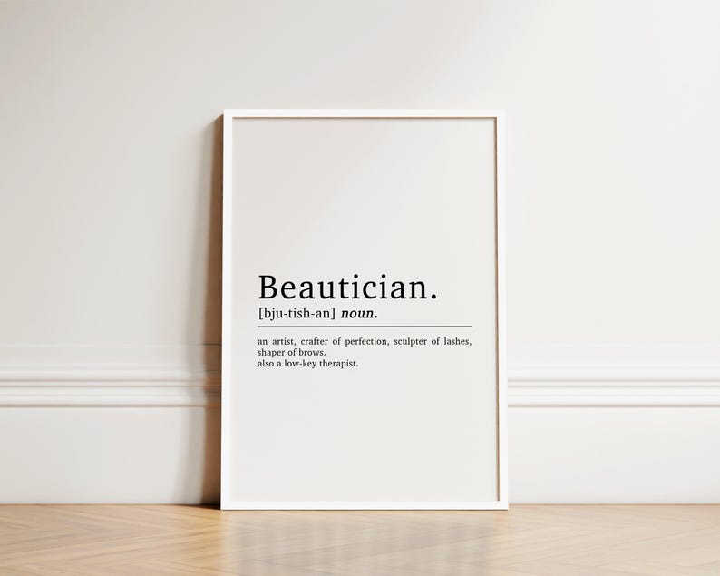 May include: A black and white printable wall art print with the definition of the word "Beautician". The definition reads: "an artist, crafter of perfection, sculptor of lashes, shaper of brows. also a low-key therapist."