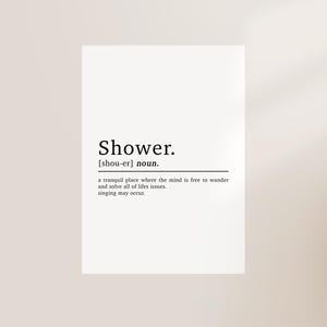 May include: Black and white typography print with the word "Shower" defined as a tranquil place where the mind is free to wander and solve life's issues. Singing may occur.