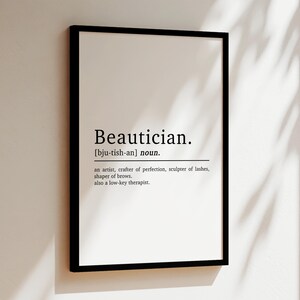 May include: A black and white printable wall art print with the definition of the word "Beautician". The definition reads: "an artist, crafter of perfection, sculptor of lashes, shaper of brows. also a low-key therapist."