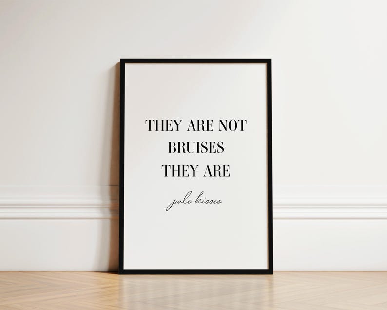 May include: Black and white framed print with the text "They are not bruises they are pole kisses".