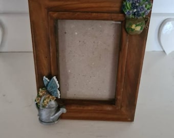 Watering can picture frame.