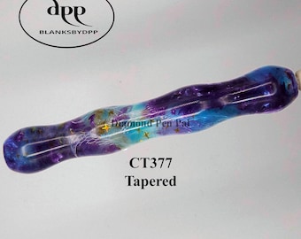 May include: A tapered pen blank featuring a swirling blend of deep purple and bright blue resin with embedded gold star-shaped glitter. The text Diamond Pen Pal, CT377, and Tapered is printed below the pen blank, with a logo for BLANKSBYDPP above.