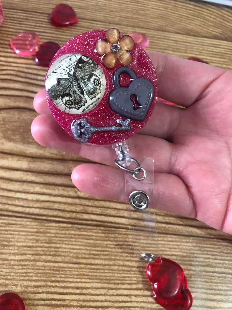 Resin butterfly lock and key badge real